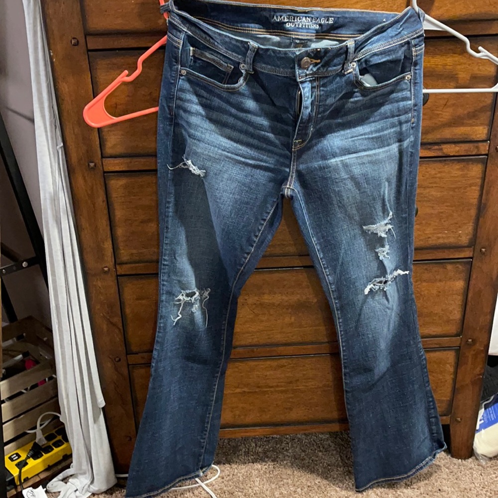 Boot cut distressed jeans